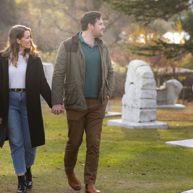 couple strolling in the rock garden