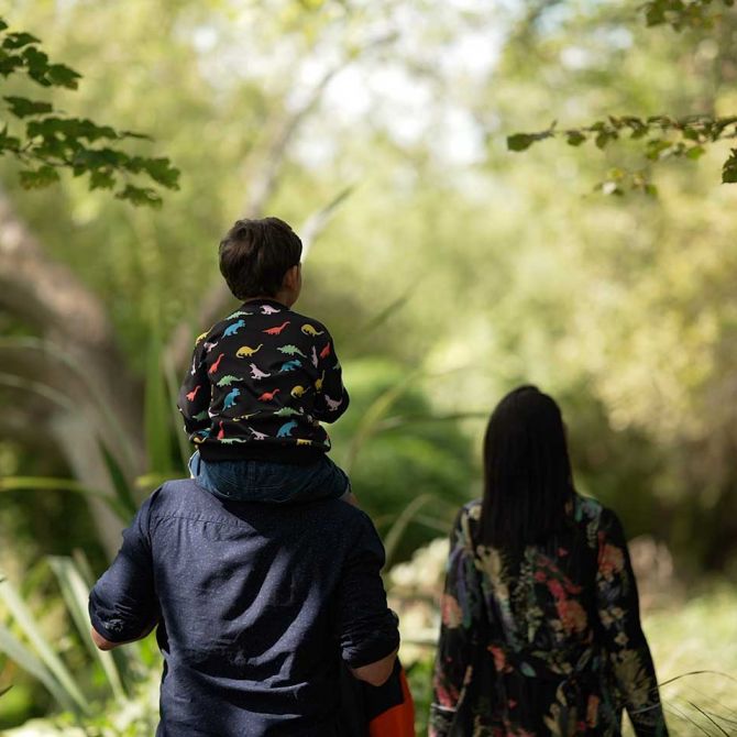 Family on Riverside Walkway