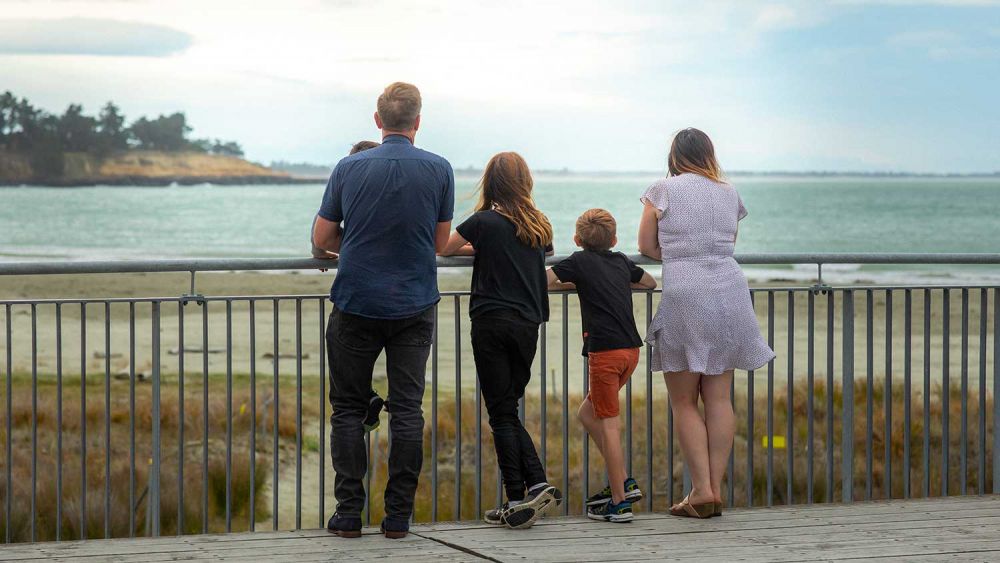 Family on Caroline Bay boardwalk
